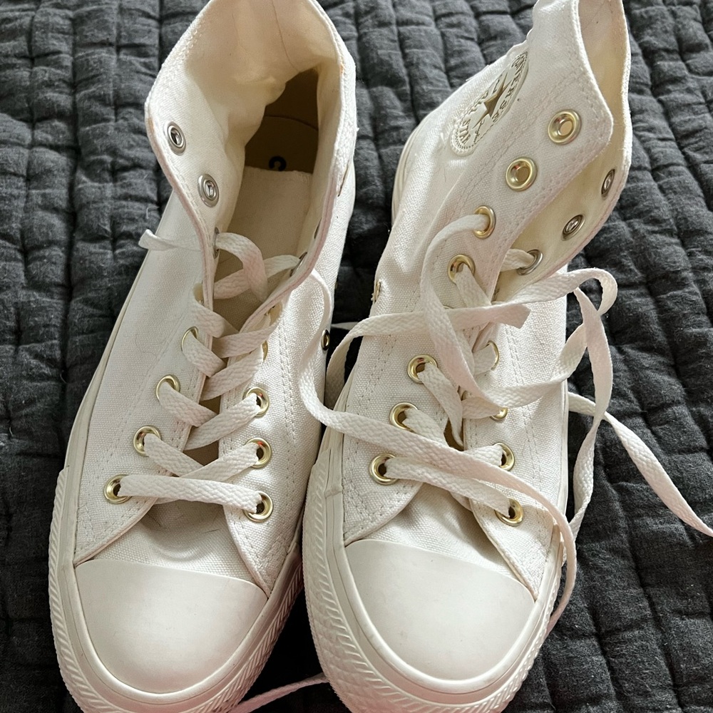 Women’s cream converse with gold accents